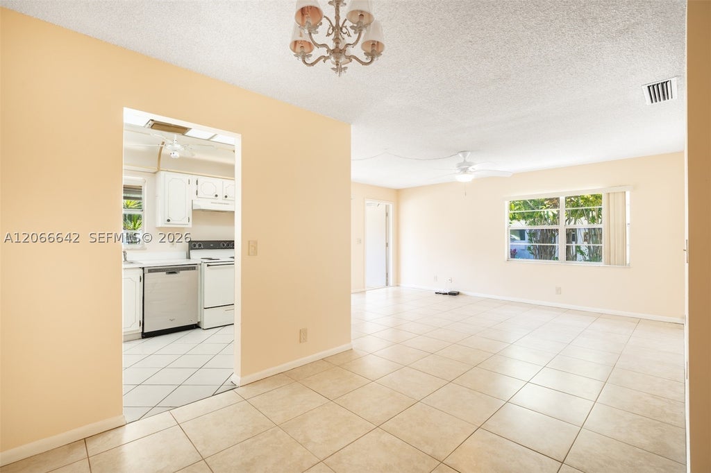 Photo of 3645 SW Natura Ave #D, Deerfield Beach, FL 33441 (MLS # A12066642)