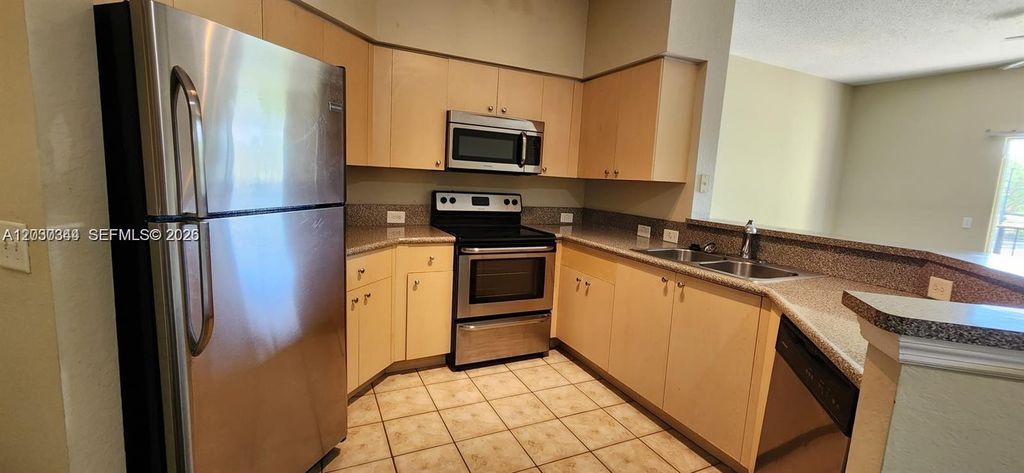 Photo of 280 Crestwood Cir #204 + GARAGE, Royal Palm Beach, FL 33411 (MLS # A12030344)