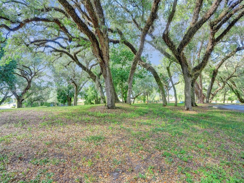 Photo of 9451 Live Oak Pl #102, Davie, FL 33324 (MLS # A11950502)