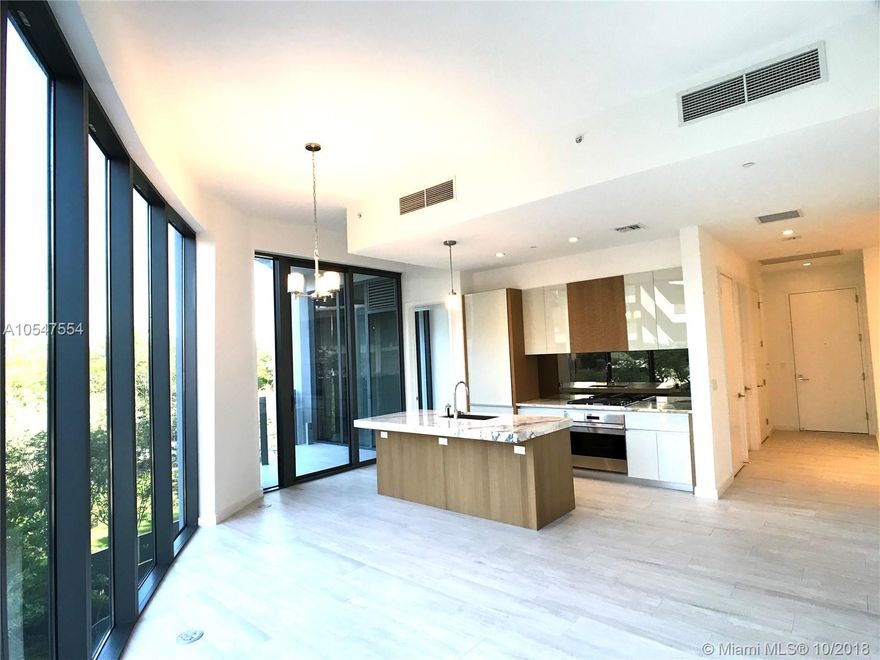 Never lived before corner unit with 2 beds + Den and 2 baths with designer lighting fixtures. This unit offers. Park Grove is the newest and most exclusive waterfront development in Coconut Grove. This spectacular unit features 10 ft high ceilings, 2 private terraces, Wolf and Subzero appliances, and marble counters, glass enclosed double shower, double sink vanities, and walk-in closet. Located in the Club Residences Tower of the Park Grove it has its own rooftop pool and deck. Sitting on 6 waterfront acres the project has 550 feet of pools in the main amenities area, amazing gym and spa and much more. The amenities are just insane and you have never seen these in Miami!