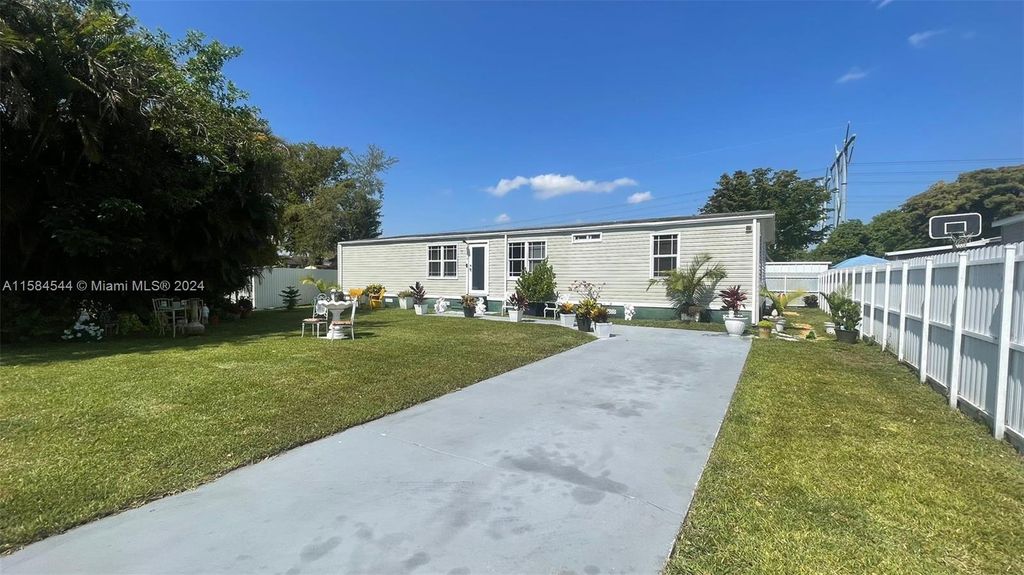 Photo of 130 NW 218th Way, Pembroke Pines, FL 33029 (MLS # A11584544)