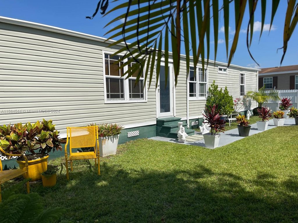 Photo of 130 NW 218th Way, Pembroke Pines, FL 33029 (MLS # A11584544)