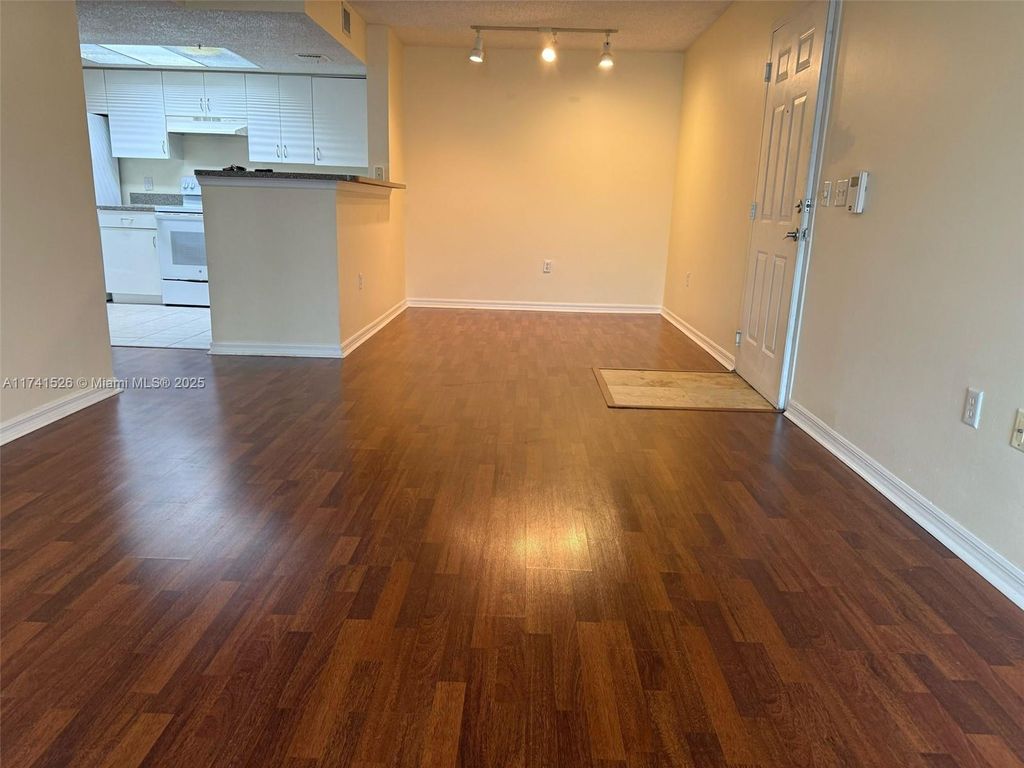 Photo of 5035 Wiles Rd #208, Coconut Creek, FL 33073 (MLS # A11741526)