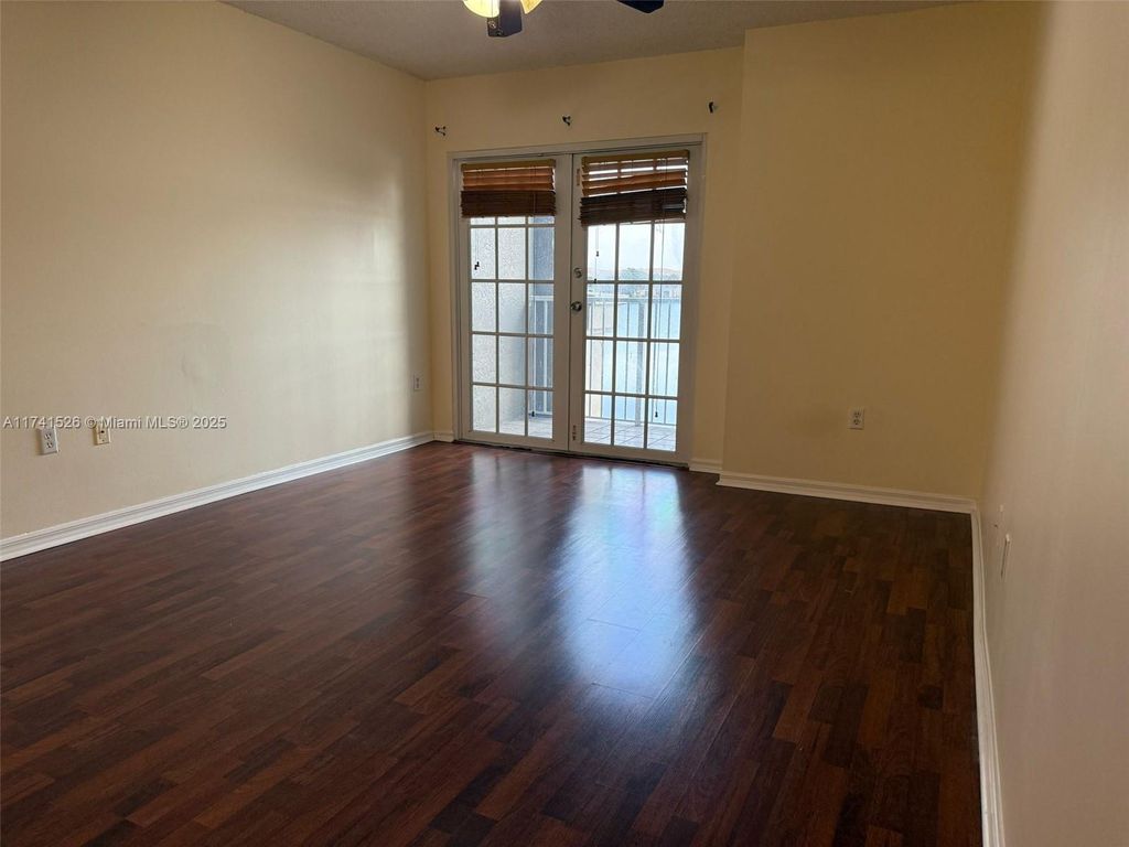 Photo of 5035 Wiles Rd #208, Coconut Creek, FL 33073 (MLS # A11741526)