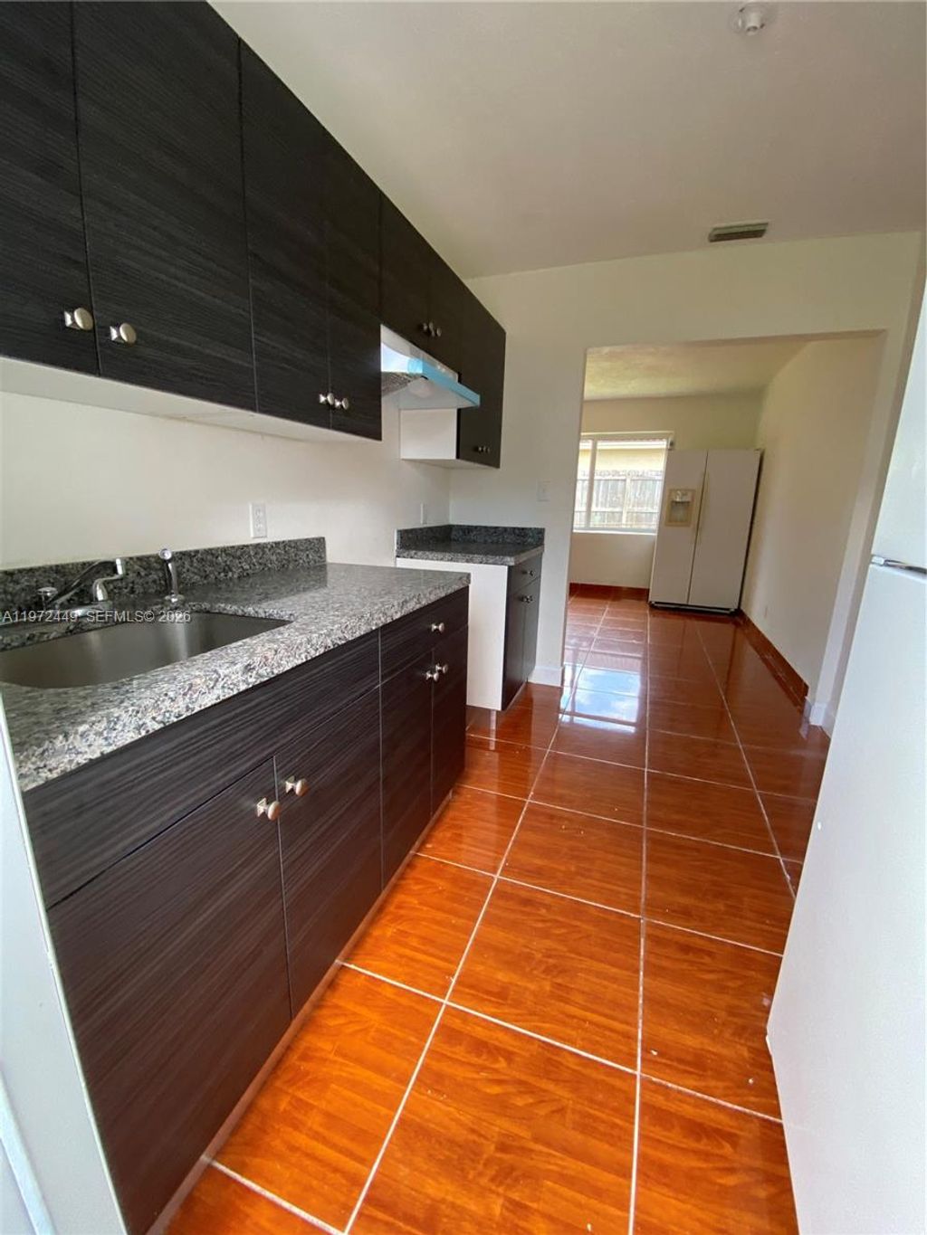 Photo of 2800 NW 14th St #B, Fort Lauderdale, FL 33311 (MLS # A11972449)