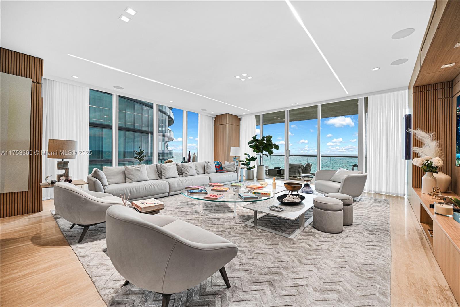 Stunning, Fully Furnished Flow-Through Residence offering Breathtaking Ocean and Intracoastal views. This home features direct ocean vistas from the living room, dining room, kitchen, and primary suite. Designed with top-of-the-line Italian cabinetry, Gaggenau appliances, and luxury upgrades including custom built-ins, enhanced closets, and electric blinds. The Turnberry Ocean Club Residences redefines luxury living with 70,000 sqft of exclusive amenities, including the Iconic 3-Story Sky Club: Sunrise/sunset infinity pools, three dining venues, movie theater, kids club, wine room, guest suites, spa, nail/hair salons, beach/pool services, and much more.