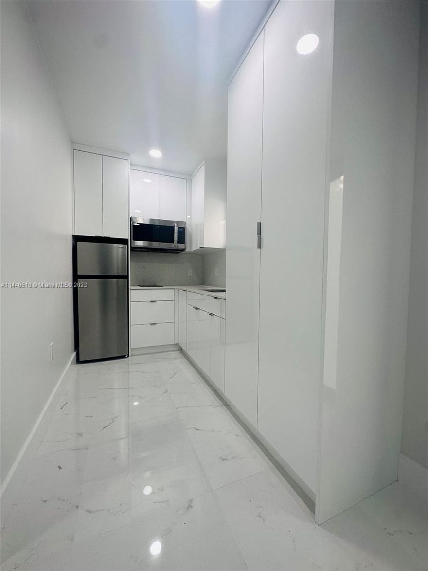 1/1 apartment all utilities included, separate room, private a/c, private patio, all new!