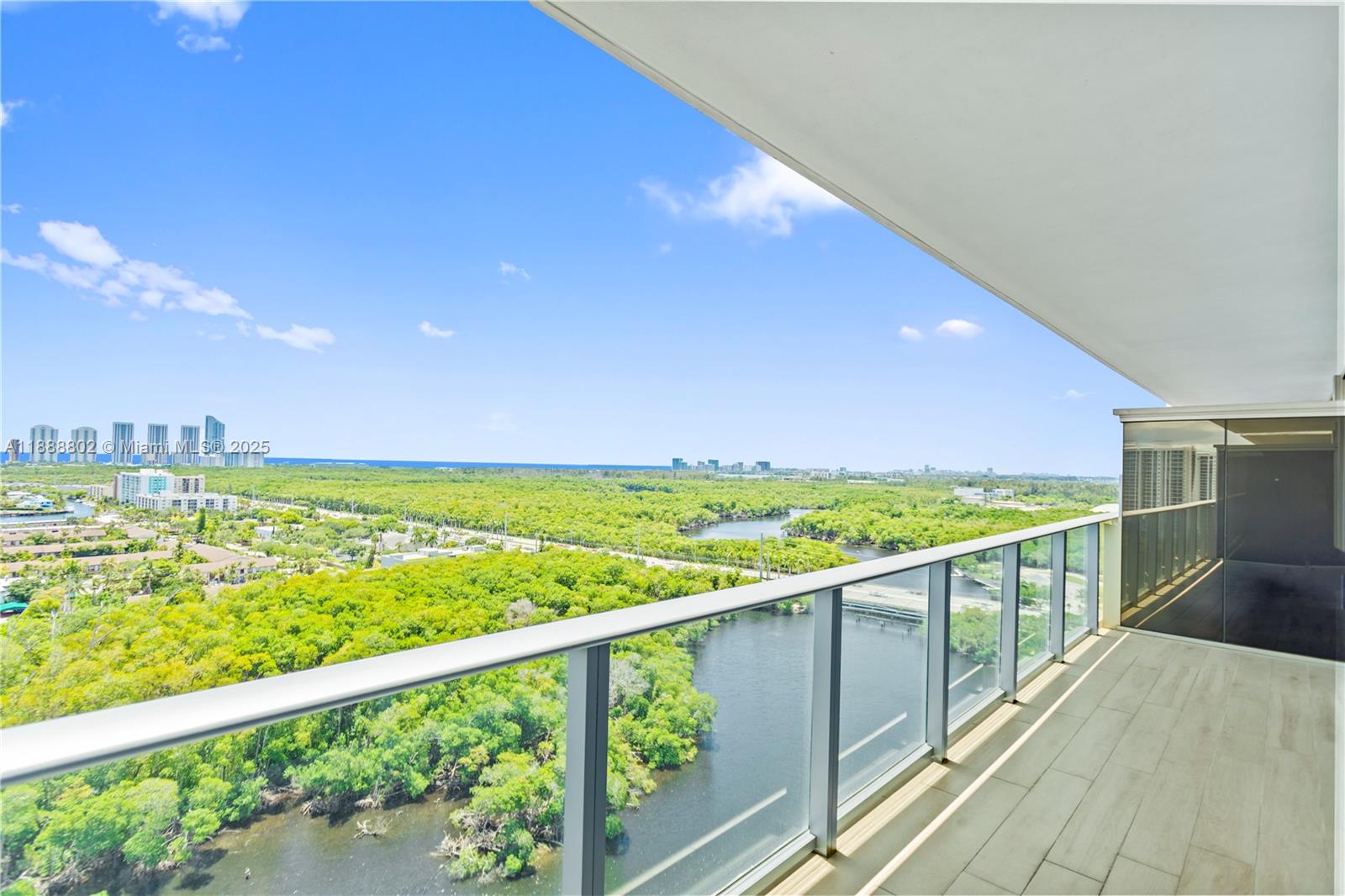 Contemporary Ocean View Living. This 2 bedroom plus den is the best of all worlds. Tile floors, quartz countertops, custom blinds, open kitchen, spacious balcony, floor-to-ceiling windows with ocean views. Enjoy the amenities such as a morning juice bar, gym , dance studio, spa with massage services, library-game area, gathering area , and open WiFi work area, semi-private elevators, beach sun tanning, water sport launch area, and private entry vestibule. The perfect City living building. 1 mile to the beach, 1 mile to the Brightline station, 1 mile to Aventura Mall, Restaurants, and Supermarkets.