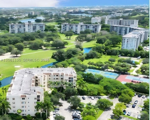 Photo of 3500 Oaks Clubhouse Dr #207, Pompano Beach, FL 33069 (MLS # A12061130)