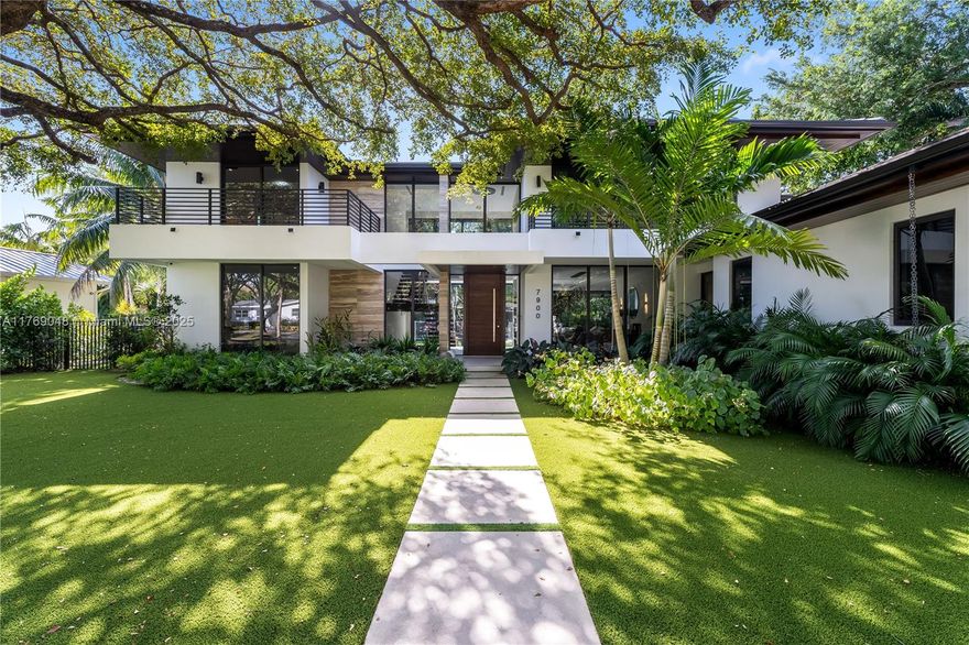 This stunning 2023 home blends modern design with exceptional craftsmanship. Offering 4,866 SF of living space (6,375 SF total) on a 13,500 SF lot, it features 6 beds & 7 baths, meticulously finished with custom details such as trimless lighting & AC ducts and a cozy living room fireplace. A grand double-height entrance with a pivot door leads to a bright, open floor plan. The master suite, on the ground floor, includes a luxurious bathroom with his-and-hers vanities, a freestanding tub, generous walk-in closets, and a private balcony. Additional features include porcelain floors, laundry room. The lush, private garden features a heated pool, covered terrace, and a fully-equipped summer kitchen. Ideally located in South Miami close to Miami’s best private schools & business centers.