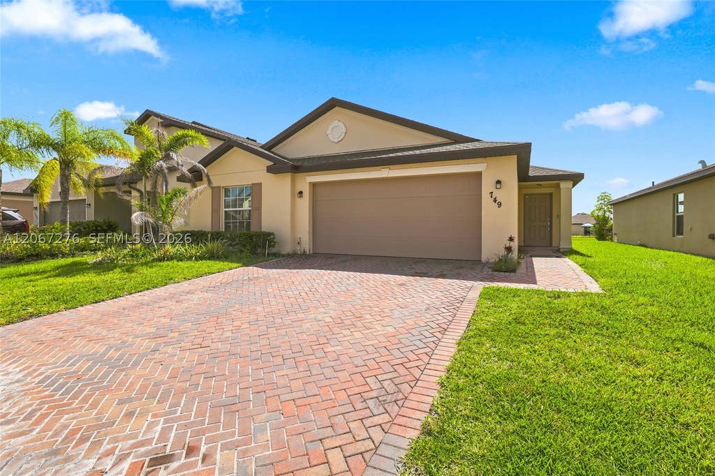 Photo of 749 Worlington Ln, Fort Pierce, FL 34947 (MLS # A12067276)