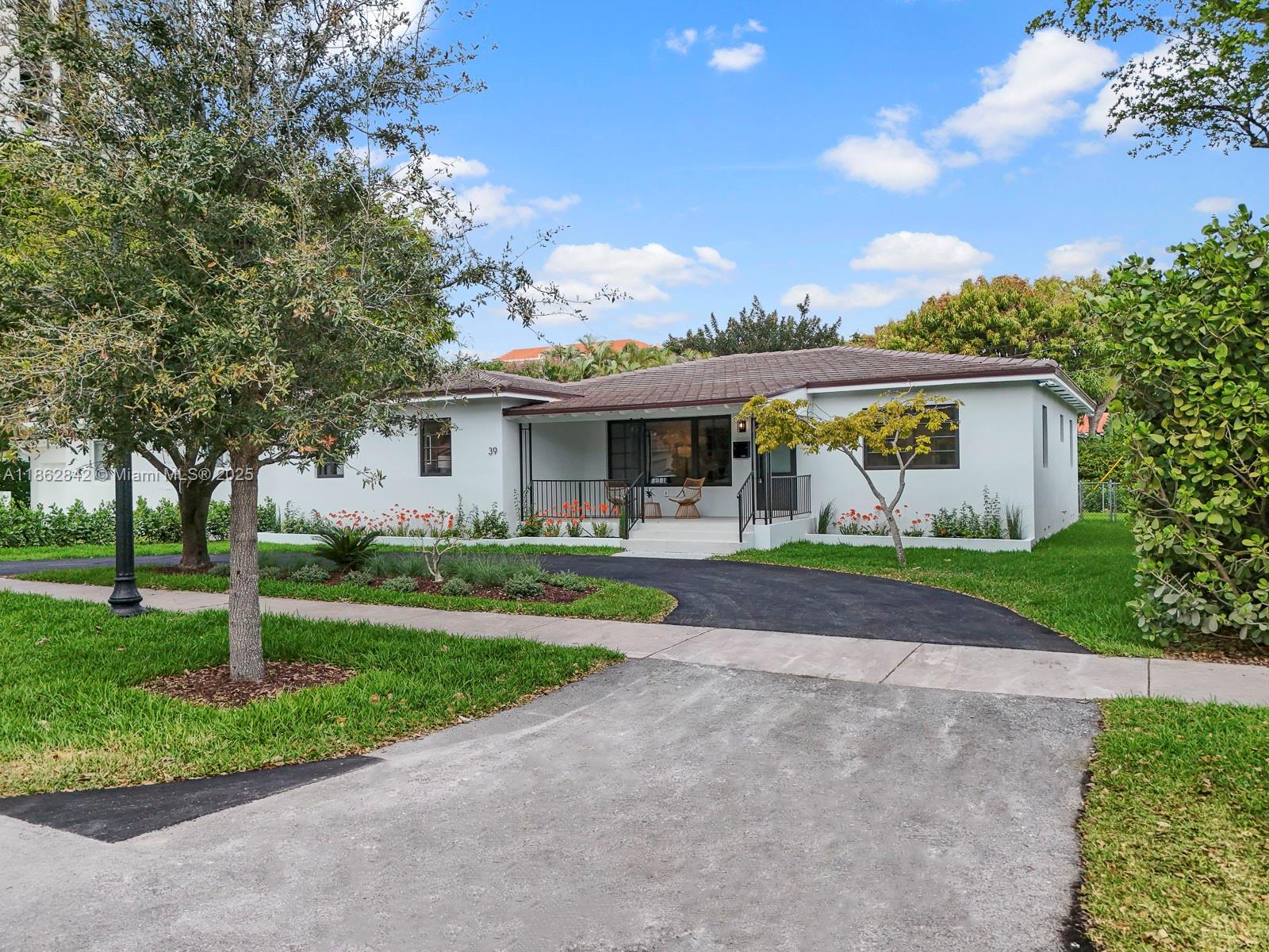 Stunning 2,653 sq. ft. remodeled home near The Plaza Coral Gables and Miracle Mile. This home features four bedrooms, three bathrooms (two en-suites), new electrical, mechanical, PVC plumbing, brand-new roof, and impact windows/doors. The contemporary kitchen boasts quartzite countertops and KitchenAid appliances. New detached carport via alley road and exterior wood deck. Experience vibrant Coral Gables living with lush greenery, dining, and shopping nearby. Perfect for modern, stylish living.