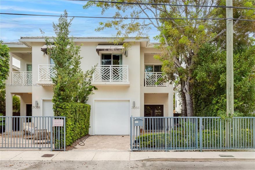 Welcome to 3056 New York Street — a fully updated, modern oasis in one of Miami’s most desirable neighborhoods.
This elegant home features a sleek, designer kitchen with premium appliances, custom cabinetry, and stylish lighting. Enjoy peace of mind with impact-resistant windows and doors, plus the convenience of a gated driveway, private garage, and EV charger.
With three spacious bedrooms and three beautifully appointed bathrooms, the layout offers both comfort and sophistication. Outside, your resort-style pool with a tranquil waterfall is surrounded by lush tropical landscaping — perfect for relaxing or entertaining.
Ideally located just moments from Coconut Grove’s top dining, shopping, marinas, and parks.
Experience elevated living — Coconut Grove at its finest.