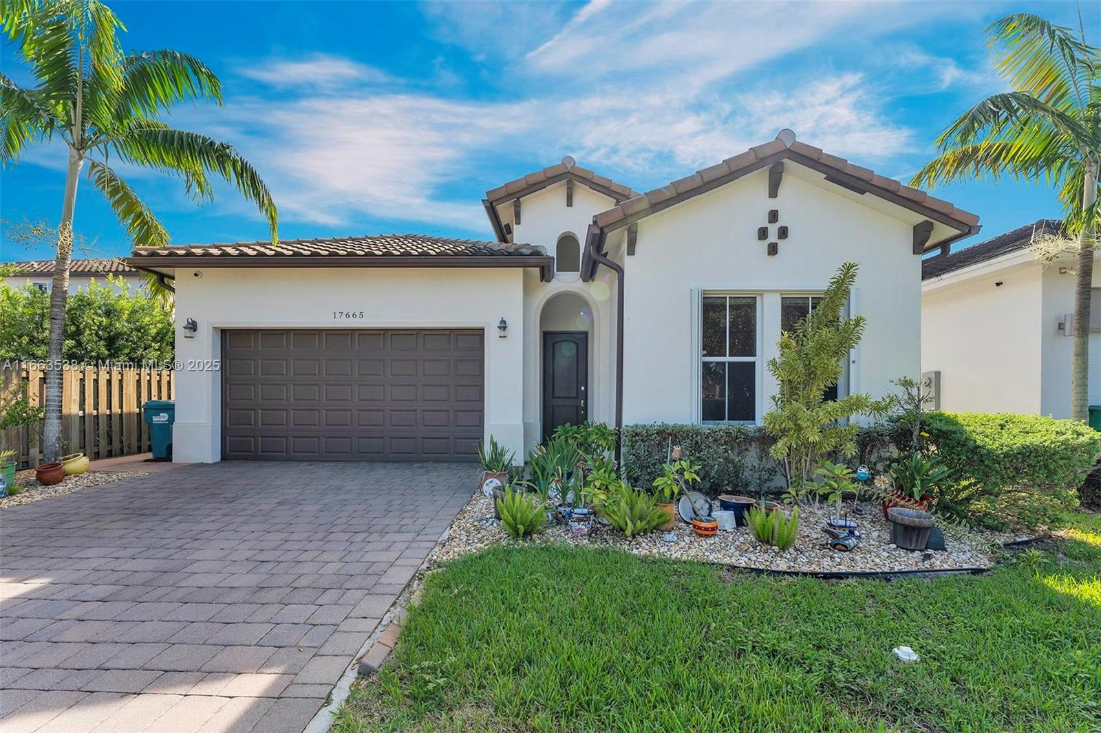 Welcome to this stunning 3-bedroom, 2-bathroom home in the highly desirable Venetian Parc community, where modern luxury meets tranquil living. Step inside to an inviting open-concept layout highlighted by high ceilings, elegant tile flooring, and abundant natural light. The gourmet kitchen is a chef’s dream, featuring stainless steel appliances, granite countertops, and a spacious island, perfect for casual dining or entertaining. The living area flows effortlessly into the outdoor space, ideal for gatherings or simply savoring Miami’s beautiful weather. Equipped with accordion shutters, this home provides peace of mind during hurricane season. Enjoy the best of both worlds—peaceful suburban living with convenient access to Miami's vibrant city life.