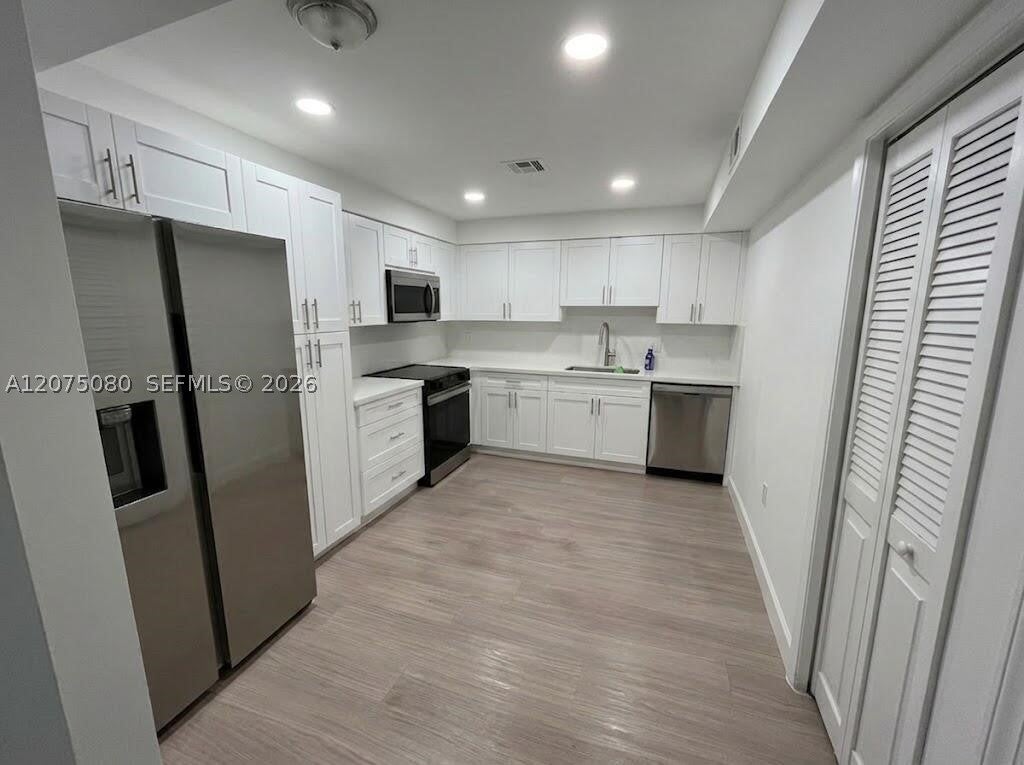 16500 Golf Club Rd 104, Weston FL 33326