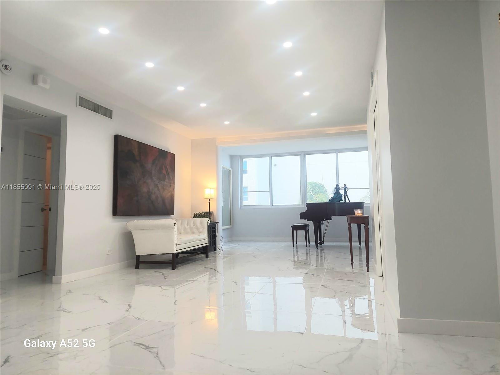 A great opportunity to own a piece of paradise, where every day is a vacation, and a every moment is a treasure. Beautifully remodeled, 1/1 + den/office/bedroom. Bright and airy, complemented with a spacious kitchen that boast plenty storage cabinets, hidden dish drying rack and a deep, wide luxury gold sink. SS Appliances thinking on all your family/friends gatherings. Carriage Club amenities: 24-hour concierge and doorman, BBQ and picnic spaces, heated pool, gym. Assigned parking spot included with the unit. Conveniently located near Fontainebleau, Soho Beach House & the Faena District.