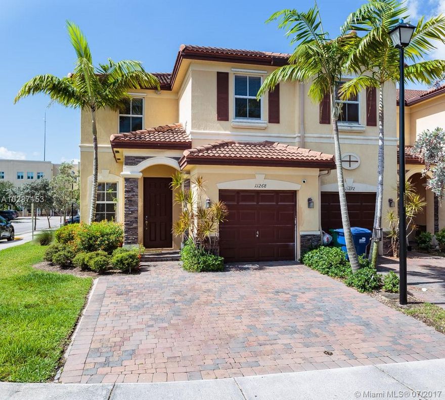 Fantastic opportunity to own a corner unit in Santorini at Islands at Doral. It features 3 Bedrooms and 2.5 Bathrooms great layout.Lots of natural light, a Spacious kitchen with natural wood cabinets that overlooks the family room. 18"x 18" ceramic tile in foyer, kitchen, breakfast and in the laundry room. Master Bedroom is very spacious as well and the bathroom has dual vanities with Moen faucets. Washer and Dryer on second floor very convenient. Marble windowsills throughout. Community amenities include a private clubhouse with swimming pool, children's pool, tot lot with playground equipment, fitness center, basketball court, tennis court, recreational areas and more.