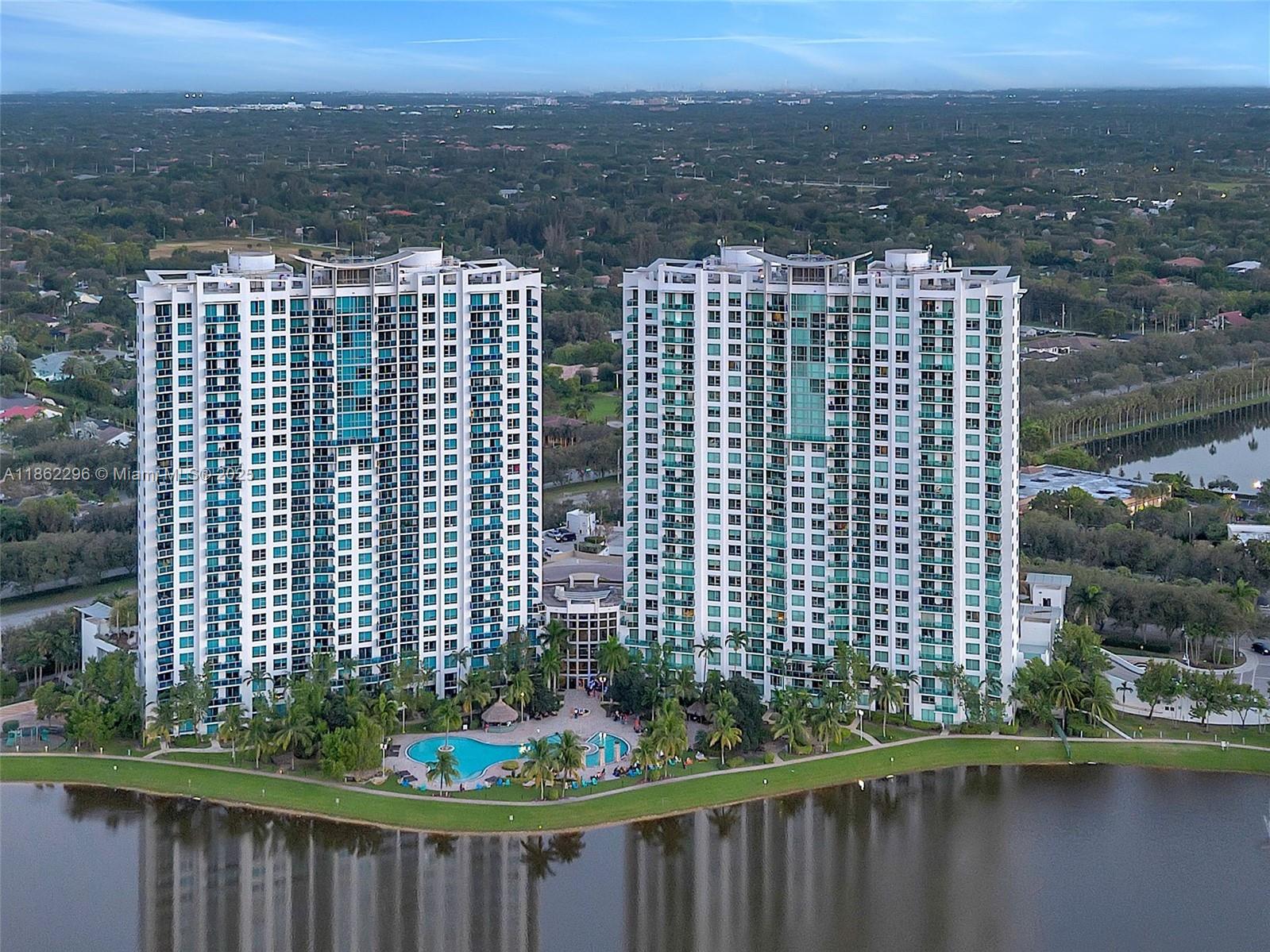 Experience luxury living on the 22nd floor of the prestigious TAO North Tower. This spacious apartment features 3 bedrooms, 2 full bathrooms, and 2 private balconies with breathtaking panoramic views. The unit includes 2 garage parking spaces, in-unit washer & dryer, water, and basic cable—all included in the rent. Enjoy resort-style amenities such as a pool table, tennis and pickleball courts, fitness center, business center, resort-style pool, cabanas, spa, BBQ & picnic area, 24/7 concierge, social room, and more. With easy access to major highways, you’ll be minutes away from Sawgrass Mills Mall, shopping centers, dining, and top-rated hospitals. This apartment combines elegance, convenience, and comfort—ideal for those seeking the best in South Florida living.
