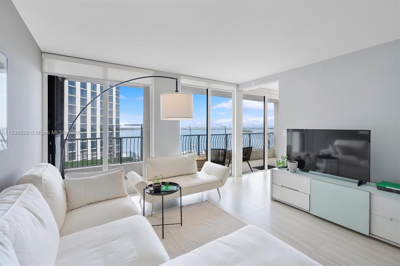 Incredibly updated 1BD/1.5BA at Venetia Condo with stunning, unobstructed water views of Biscayne Bay & Miami Beach. Renovated kitchen with quartz counters, stainless steel appliances, and sleek ceramic tile floors throughout. Spacious bedroom, modern bath, walk-in closet, and oversized balcony. Enjoy a full-service building with 24-hr concierge, racquetball/tennis courts, gym/spa, salon, sports bar, marina, and more—plus a brand-new front desk underway. Steps from Margaret Pace Park, Publix, restaurants, Wynwood, and future 33-acre Underdeck Park, with easy access to Brickell & Miami Beach. Will not last!