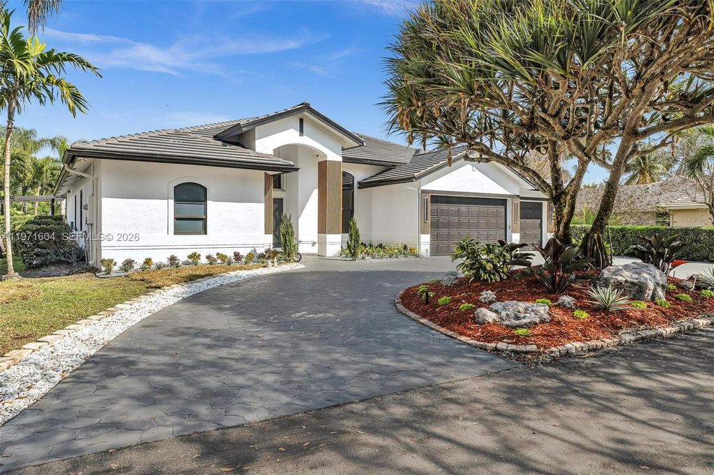 Photo of 12555 SW 34th Pl, Davie, FL 33330 (MLS # A11971604)