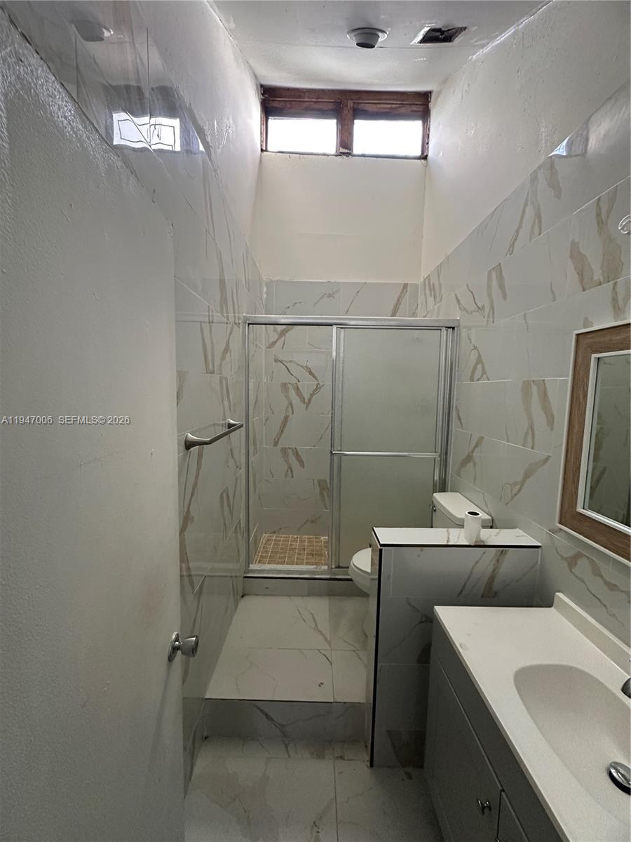 WOODSCAPE TOWNHOMES - Residential