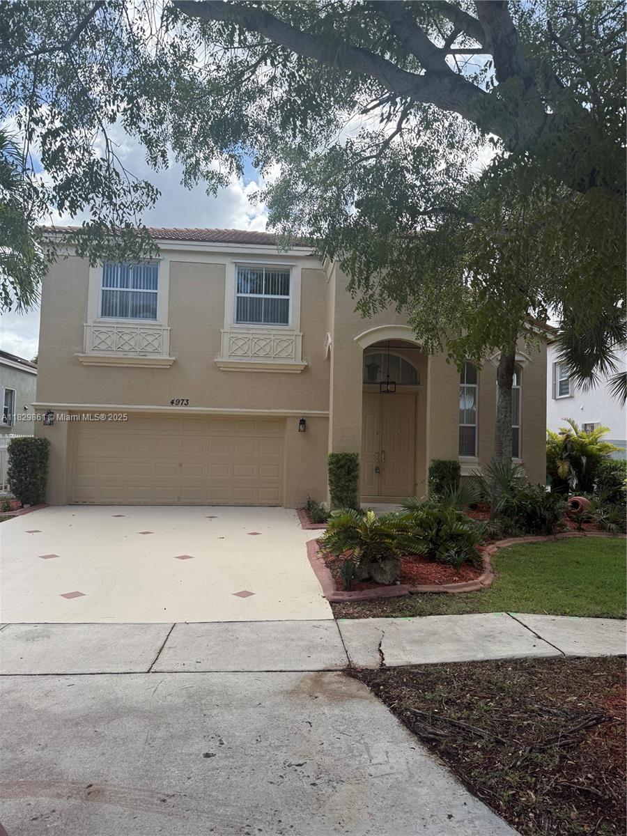 This stunning two-story home, located in a prestigious gated community, offers the perfect blend of luxury and comfort. Freshly painted, recently renovated, this beautiful 4 bedroom,3 bathroom 2story house features brand new kitchen appliances. 1st level has 1 guest room, family room, kitchen, dining room, living room and a full bath. It is ideal for a growing family and those who like to entertain. The property boasts an inviting backyard with breathtaking lake view, a perfect spot for relaxation. Enjoy exclusive access to the community amenities including a nice park for kids, a sparkling pool, a well equipped gym and 24/7 security. This home is rare find, combining convenience. Association application fee required and approval. Deposit is refundable at the end of the term.