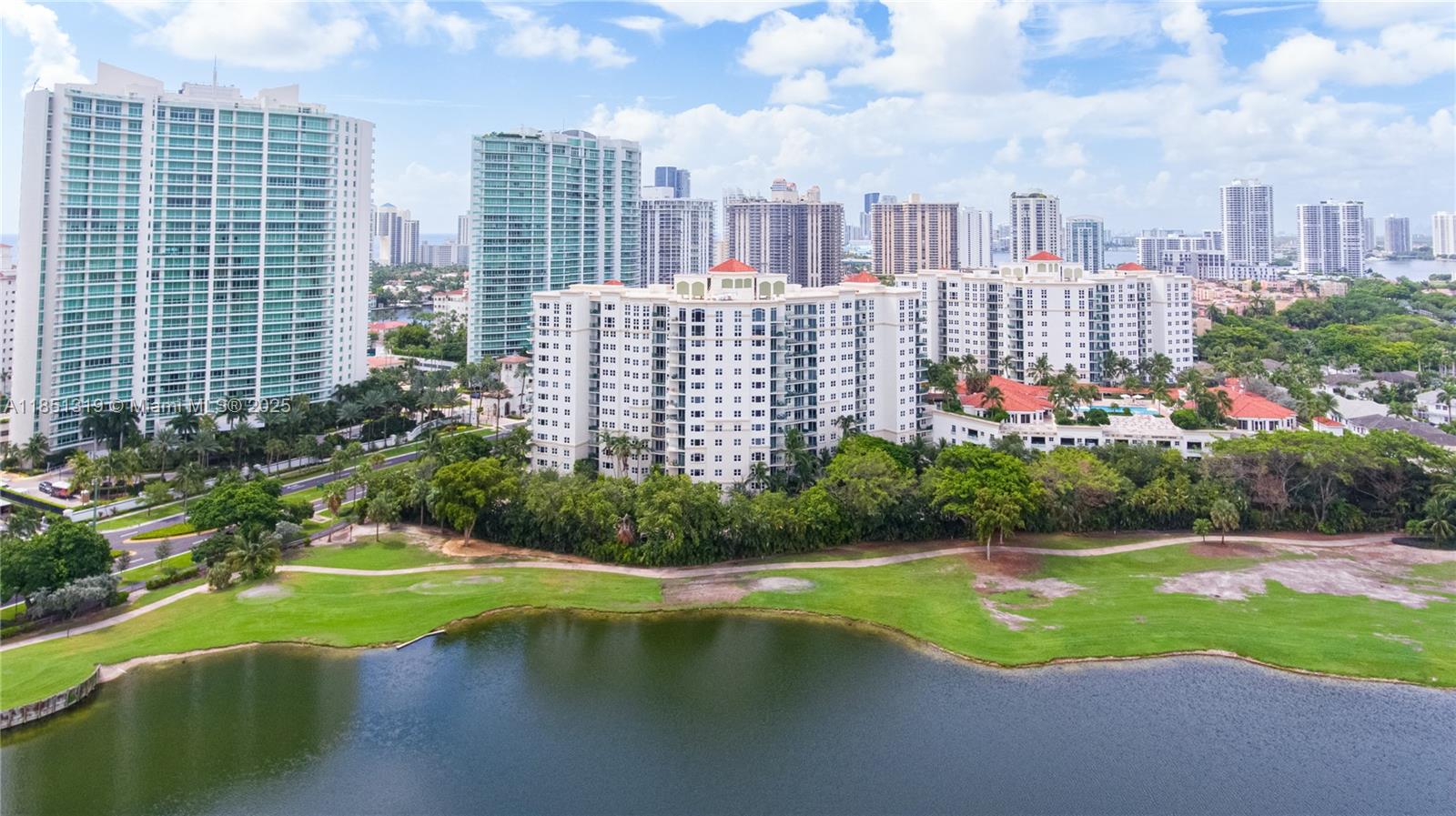 Live the dream at Turnberry Village in Aventura's most exclusive section. This contemporary 2-bed/2-bath unit offers stunning ocean, and golf course views from every room. Enjoy elegant Crema Marfil marble floors, a smart split floor plan, and a kitchen with stainless steel appliances and in-unit laundry. Experience 5-star amenities including an infinity-edge pool, state-of-the-art fitness center, full-service concierge, and 24-hour security. Perfectly situated on the Turnberry Isle Golf Course, minutes from Aventura Mall, dining, and Miami's best school district. This is a must-see for luxurious, convenient living!