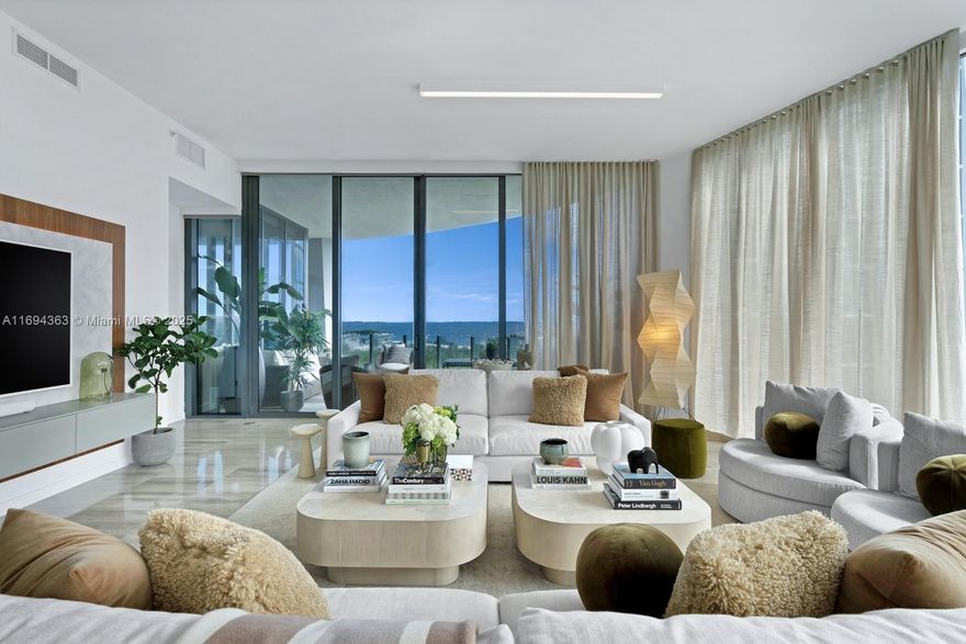 Rarely available A line at the highly coveted Park Grove. Stunning 4bd/4.5ba corner unit offers the pinnacle of elegance w breathtaking upgraded finishes & a priv elevator entry for the utmost exclusivity. Soaring 12' floor-to-ceiling windows, wood paneling, textured walls & oversized terrace to take in the mesmerizing sea views, relax or entertain. Priv office, library, custom closets, elegant window treatments & Lutron lighting/shades. Gourmet kitchen w top-of-the-line appliances, leathered marble countertops & wood cabinetry. Unparalleled amenities: concierge, 24-hr valet, state-of-the-art fitness center, signature spa, children's play room. Don't miss this rare opportunity to experience the epitome of luxury living in the heart of Miami's most sought-after neighborhood, Coconut Grove.