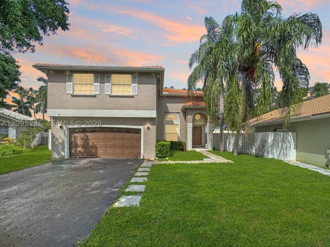 Photo of 1015 NW 125th Ter, Sunrise, FL 33323 (MLS # A12095226)