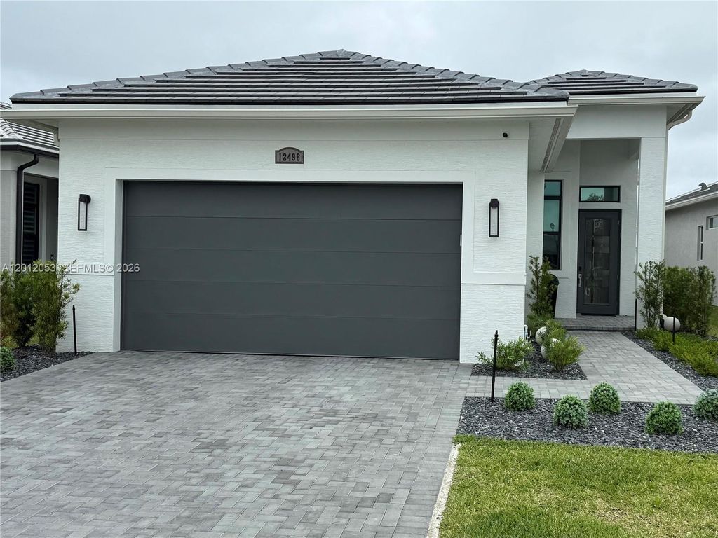 Photo of 12496 SW Lunata Way, Port St Lucie, FL 34987 (MLS # A12012053)