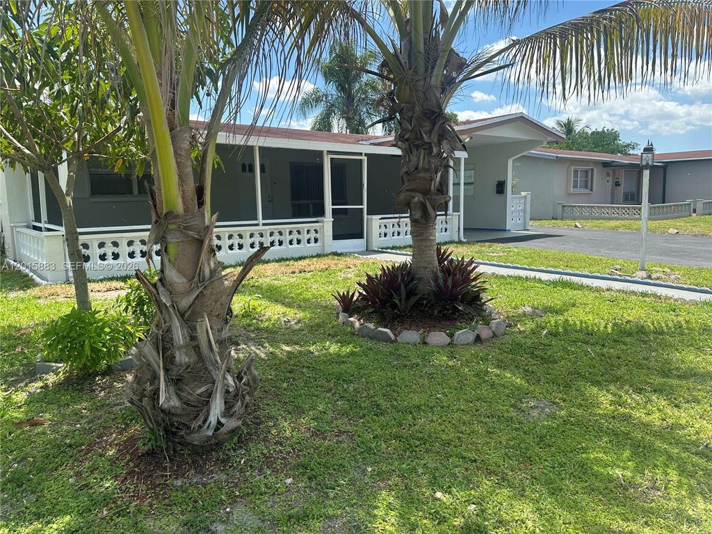 Photo of 4616 NW 39th St, Lauderdale Lakes, FL 33319 (MLS # A12015883)