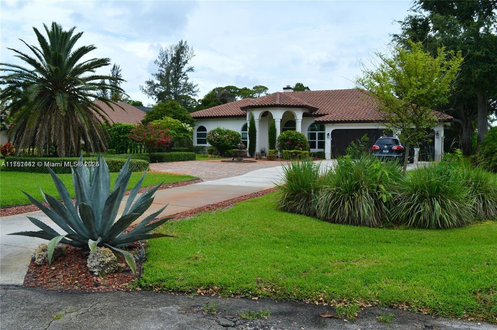 Photo of 6963 NW 66th Ave, Parkland, FL 33067 (MLS # A11751442)