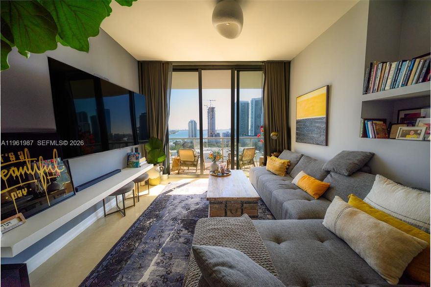 Be part of the 2Midtown community. Indulge in this beautifully remodeled 2-bed 2.5-bath condo with direct, unobstructed bay and ocean views, and an ever-changing skyline of Edgewater and South Beach (facing east, sunrises). This condo was tastefully upgraded with a kitchen backsplash and custom handles, new in-unit washer/dryer, all stainless steel appliances, new dishwasher, stovetop, ceiling lights, additional spotlights in the kitchen, walk-in closet buildouts, and balcony floors. The highlight of this line and floor is an expansive balcony connecting the bedrooms and living quarters, for endless outdoor entertainment and relaxation. The layout is a split floor plan, for extra privacy in each bedroom. The location is at the heart of Midtown with major shops, groceries, services at your doorstep. Look no further, call this home! Be in the heart of the action.
(Option to be purchased fully furnished for additional amount)