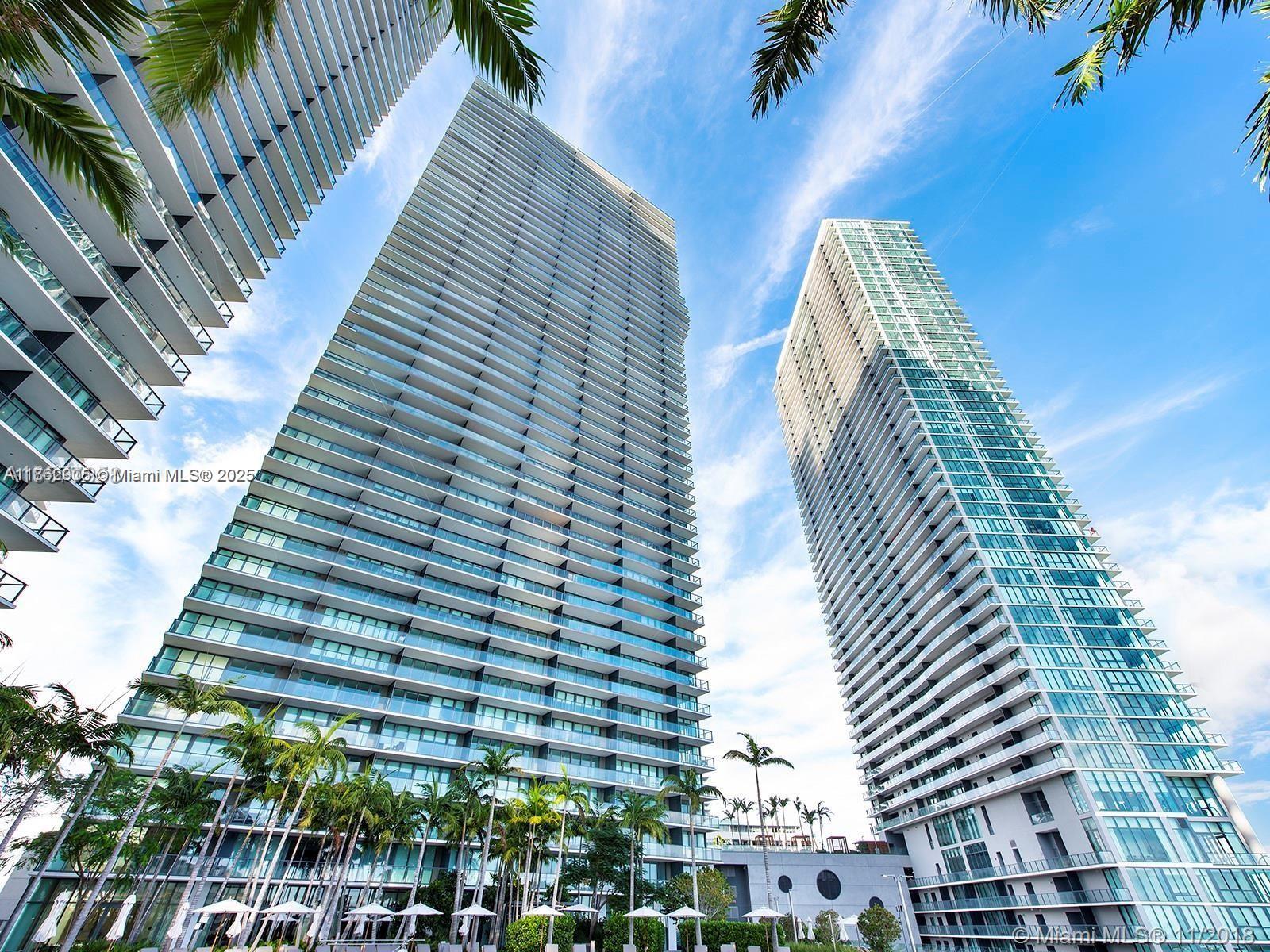 Stunning 1BD/1.5BA Unit for Rent at Paraiso Bayviews! Luxurious living with open-concept area, Bosch appliances, washer/dryer, and private balcony with breathtaking views. Amenities: rooftop pool with 360-degree city and bay views, fitness center, spa, tennis courts, kids' playroom, movie theater, and BBQ areas. Prime location near Midtown, Design District, and Brickell, offering the best of urban living with resort-style amenities.