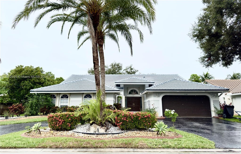 Photo of 5136 NW 99th Way, Coral Springs, FL 33076 (MLS # A11812050)