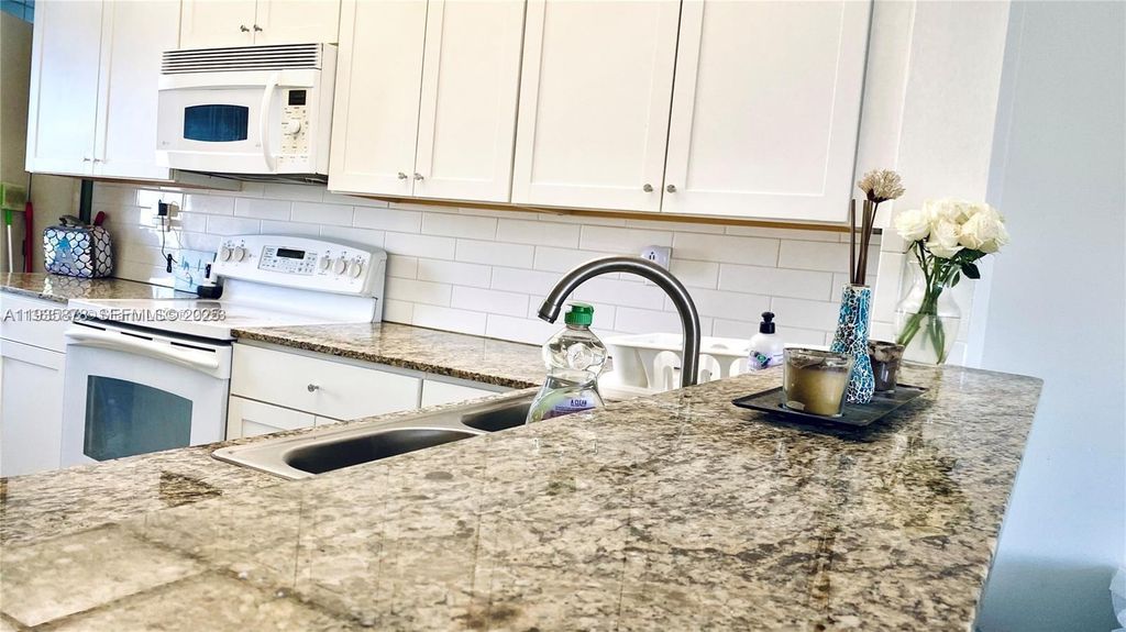 Photo of 2931 SW 87th Ter #1923, Davie, FL 33328 (MLS # A11935878)