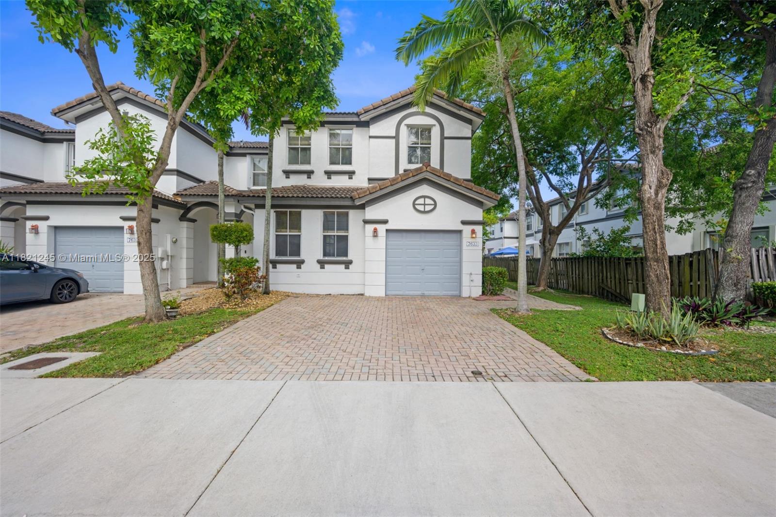 BEST PRICE IN COMMUNITY! Welcome to this beautiful and bright 3-bedroom, 2-bathroom townhouse located in the prestigious Doral Isles community (Windward). This home offers a spacious layout, plenty of natural light, and a comfortable environment perfect for families. Bright and open living spaces, Spacious layout with modern finishes, Private parking and guest spaces. CONVERTED GARAGE, ENCLOSED PATIO. 24/7 Gated Security, Clubhouse, Resort-style Pools, Fitness Center, Tennis and Basketball Courts, Walking and Biking Trails, Kids’ Playground, Beautiful lakes and landscaping throughout. Close to Dolphin Mall, International Mall, and local shops, Surrounded by restaurants, cafés, and grocery stores. Top-rated schools nearby, Easy access to highways and Miami International Airport
