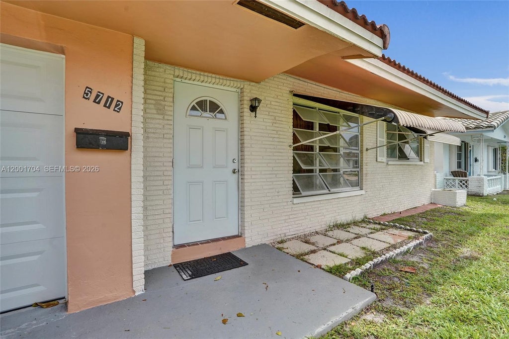 Photo of 5712 NW 66th Ave, Tamarac, FL 33321 (MLS # A12001704)