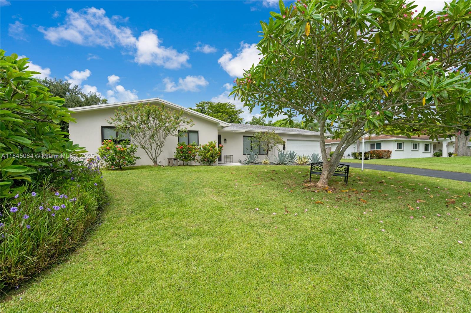 Renovated in 2024, Spacious and beautifully updated 4-bedroom, 3-bath home on a large lot in a quiet Miami neighborhood. This single-family residence features an open-concept living area with abundant natural light, a modern kitchen with stainless steel appliances and granite countertops, and a comfortable split-bedroom floor plan. Enjoy a private backyard with a covered patio—perfect for entertaining or relaxing. Impact windows and doors, updated bathrooms, and a circular driveway add convenience and value. Located near top schools, parks, shopping, and major highways.
