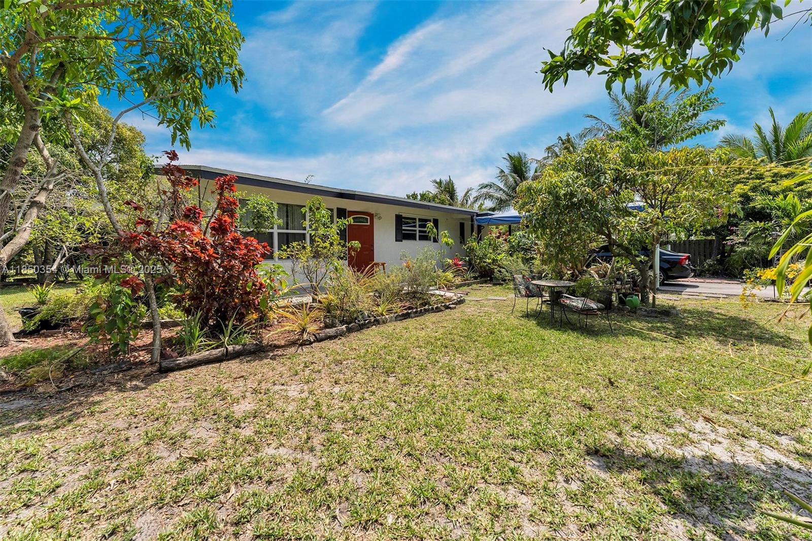 2/1 Cute Cottage surrounded by tropical fruit bearing trees. Extra room can be used as another bedroom. Just off the turnpike close to Hard Rock, Nova University and the Tower shops and much more...Plenty of room for your boat, camper, no HOA. Large privacy fenced in yard on a quiet street. All major systems of house have been redone in last 5 years.. Impact windows, ac, roof, electrical panel, water heater. New vinyl flooring in bedrooms. Easy to show. Screened patio, relax in your private backyard and start barbecuing. Ready for immediate occupancy. Owner may be flexible to accommodate lease a little less than a year if needed