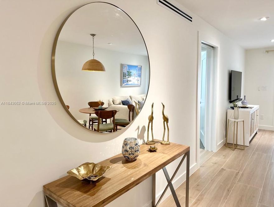 Welcome to this exceptional 2/2 apt nestled in the heart of Olde Naples. COMPLETED REMODELLED. Unit in first floor, corner unit is just steps away from the 5th Ave and a walking distance to the beach.. Can be sold with or without furniture. The master bed walk-in closet with a Hotel safe box, full bath with a shower. The second bedroom, full bathroom. ONLY apartment in the building with Full-size W/D INSIDE the unit. Min rental period 1 month, 4 times a year. Screen balcony, with the pool a few feet away. Assigned parking space and ample guest parking. This prime location offers multitude of restaurants, upscale shopping, and entertainment options. For your daily grocery needs, Wynn's boutique gourmet market is just a block away. Naples Hospital is also within a three-block radius