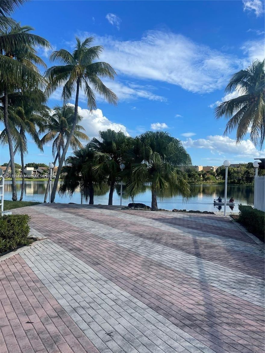 The units at the Beach Club on Fontainebleau Blvd are some of the largest in the area. This 2 bedroom and 1.5 bath townhouse style condo with 2 deeded assigned parking spaces which is extremely rare for the area. This is different than having access to a 2nd decal and parking in a visitor spot. The guard gated community includes amenities like outdoor tennis & racquetball courts, gym, 3 pools and children's playground, Unit has a great tenant in place with a lease running through May 2025 paying $2100 per month, asociation pays water.  25% down payment required