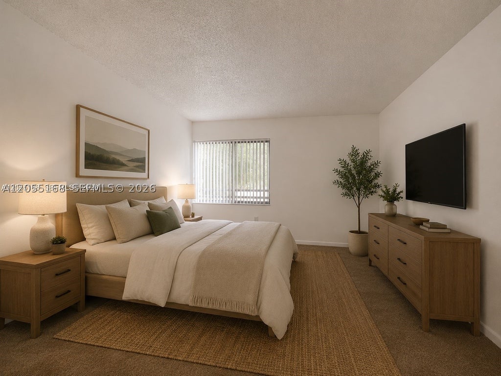 Photo of 701 N Pine Island Rd #202, Plantation, FL 33324 (MLS # A12055168)