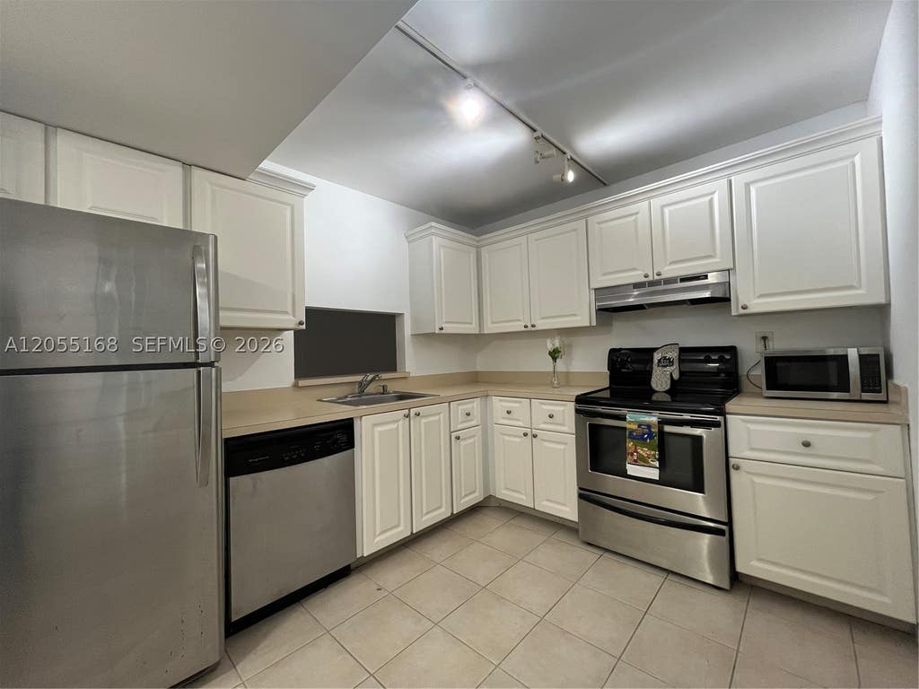 Photo of 701 N Pine Island Rd #202, Plantation, FL 33324 (MLS # A12055168)