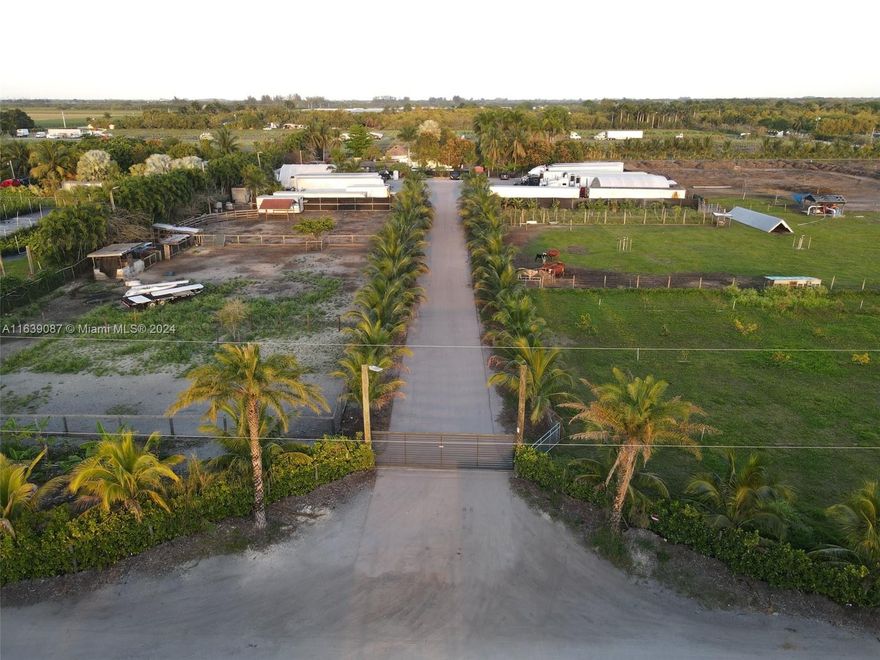 Welcome to this versatile property offering endless opportunities! Spread across 10+acres, this estate features a charming 3 bedrooms, 2 bathrooms main house, complete with impact windows and doors, complemented by a newly shingled roof in 2022, additional separate rental house that generate income, a gazebo for outdoor relaxation, a dedicated area in the property is currently utilized for cattle, designated section for parking trucks, functional trailer use as an office, diesel turbine and electrical sprinkler system. This property is thoughtfully fenced for privacy and security with automatic gates for ease of access. This unique property combines residential comfort, rental income potential, agricultural utility, and commercial functionality!!! Located minutes away from Krome Avenue.