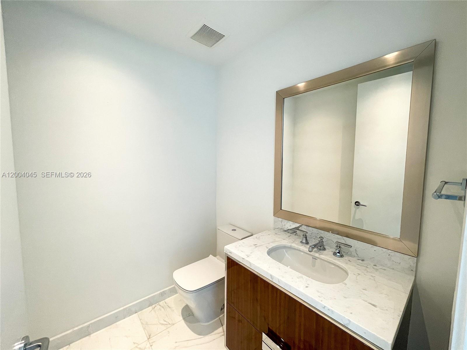 15701 COLLINS CONDO - Residential Lease