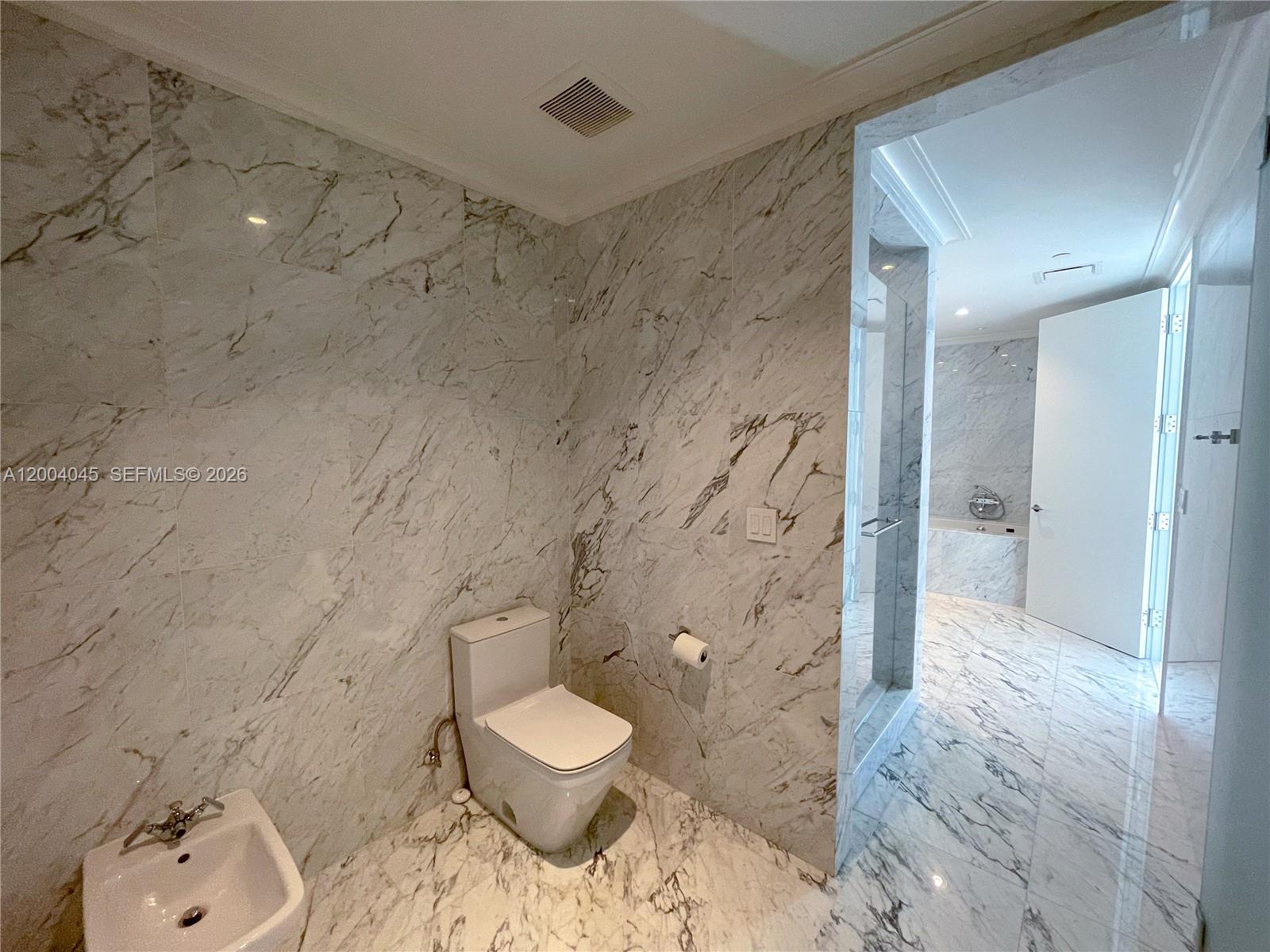 15701 COLLINS CONDO - Residential Lease