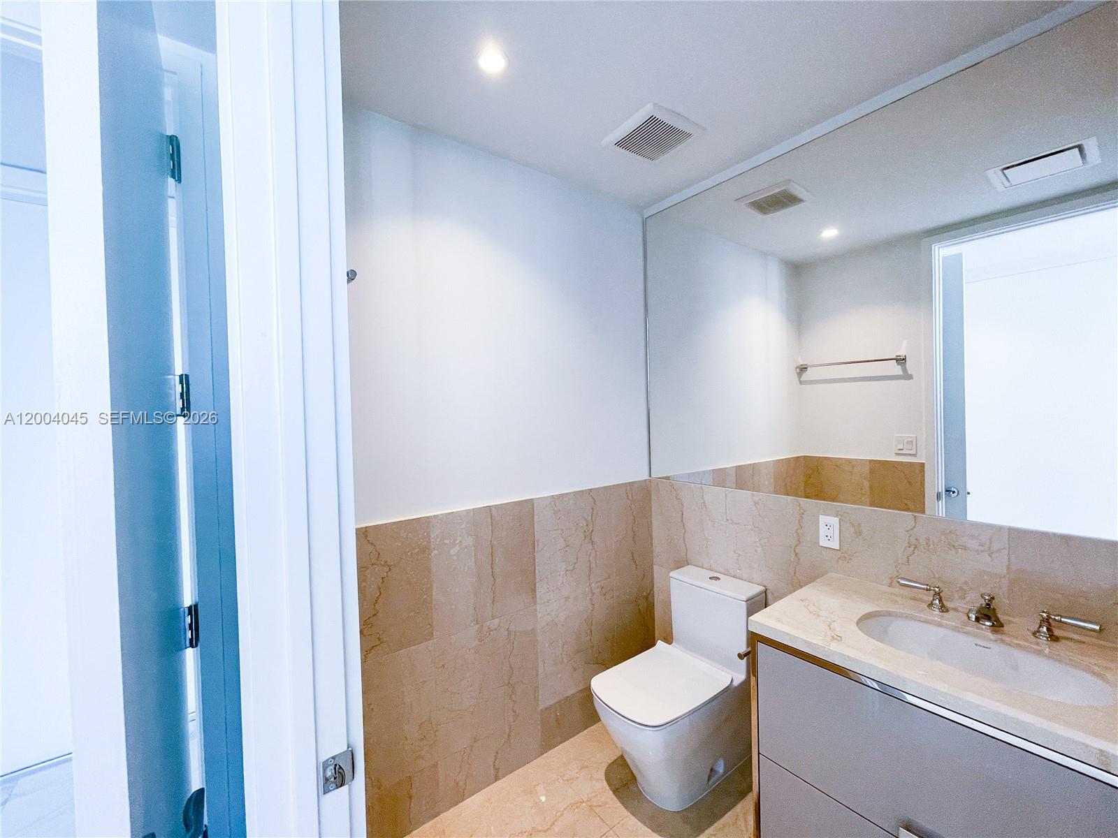 15701 COLLINS CONDO - Residential Lease