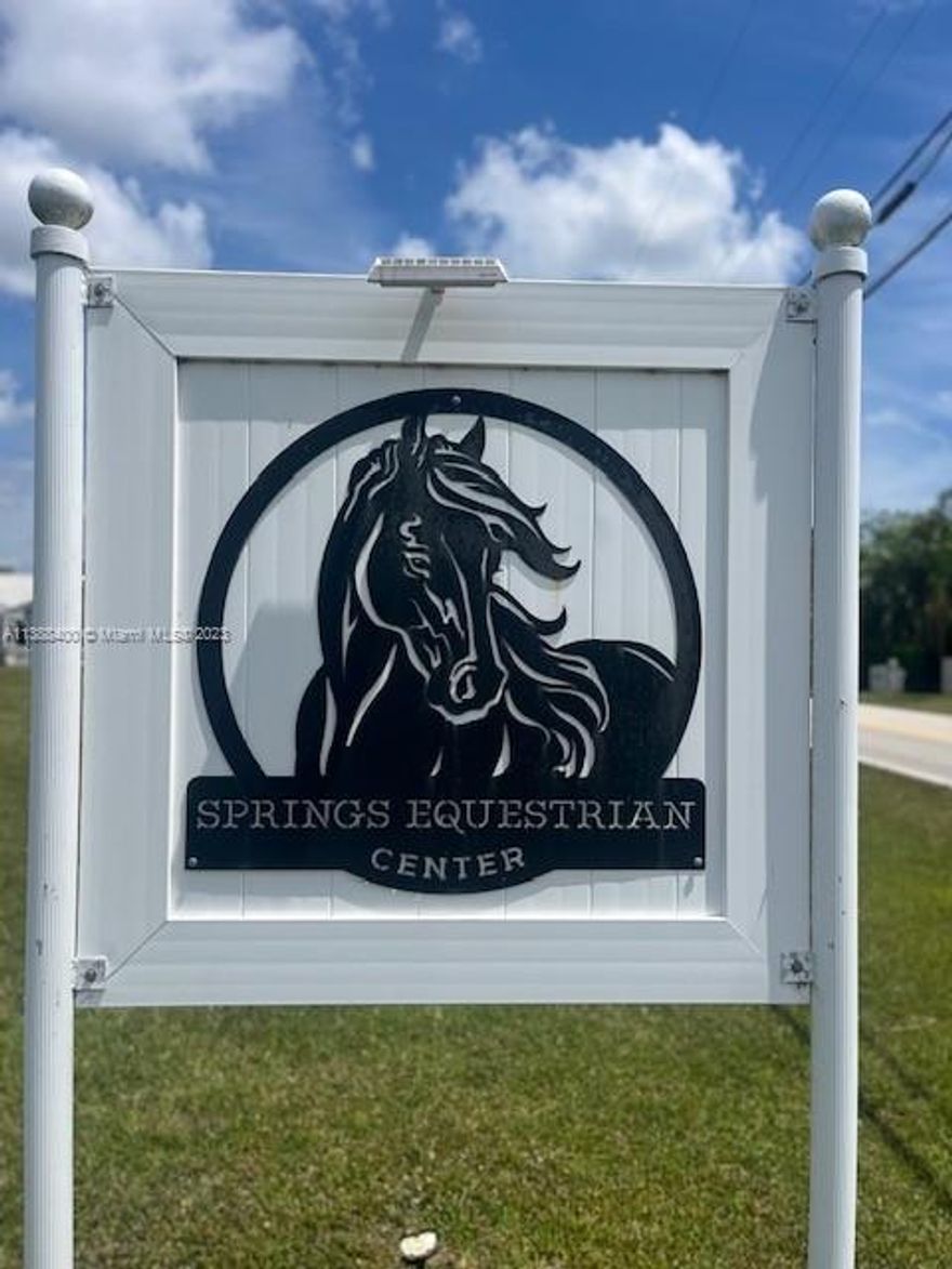 Impeccably updated 3-bed, 3-bath home with 1-bed, 1-bath in-law quarters in Plantation Acres. Modern luxury and tranquility on 2.5-acre lot. Impact windows flood home with natural sunlight  light. Redesigned kitchen with high-end appliances, sleek cabinetry, and ample counter space. Completely transformed bathrooms with premium finishes. New marble floors throughout. Below ground pool and jacuzzi for relaxation. Income-producing barn for hobbies or revenue. Ideal for equestrian enthusiasts. Tranquil retreat close to amenities. Own this updated home with barn, pool, and jacuzzi. Schedule a showing today. Potential to purchase the existing 1.25 acre lot next to the property.