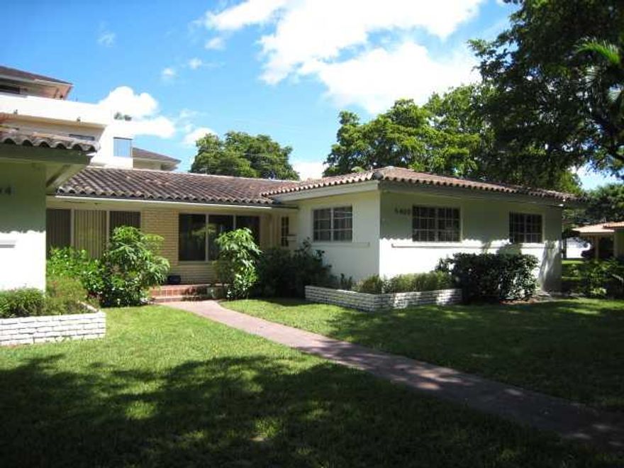 Shaded side of a spacious duplex, 1436 sf. encompassing 3 bedrooms & 2 baths. Located on a lush & quiet tree lined street, with only local traffic and with-in walking distance to South Miami & U.M.  Property has a back yard and use of a park like side yar d. Across the street from a small city park. L/A accompany. 24 hr. notice to show.